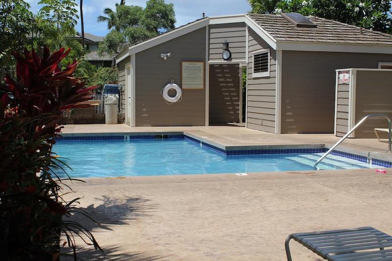 Pool deck among well-kept gardens